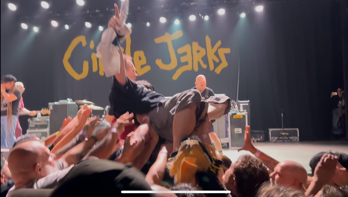 Crowd surfing at a hardcore show