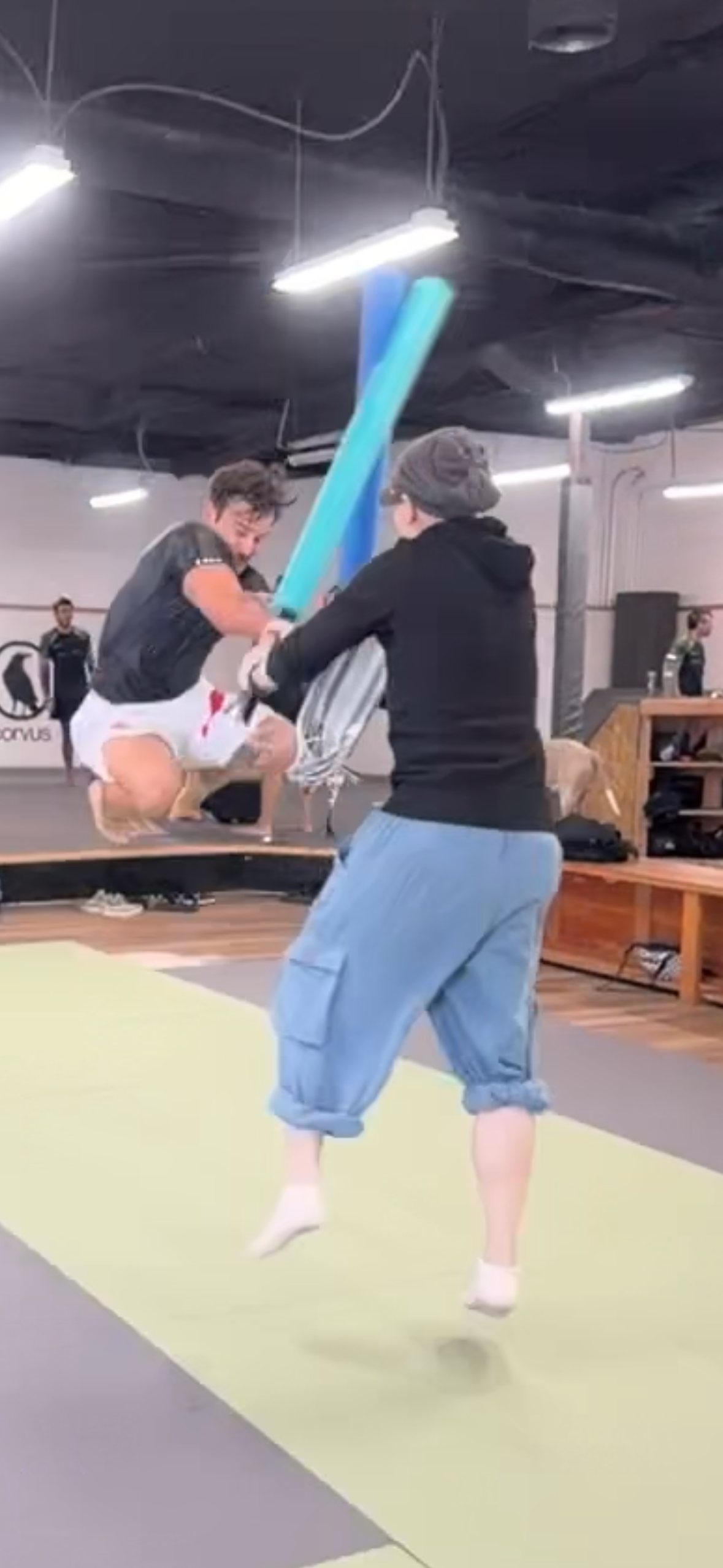 Foam sword combat on mats